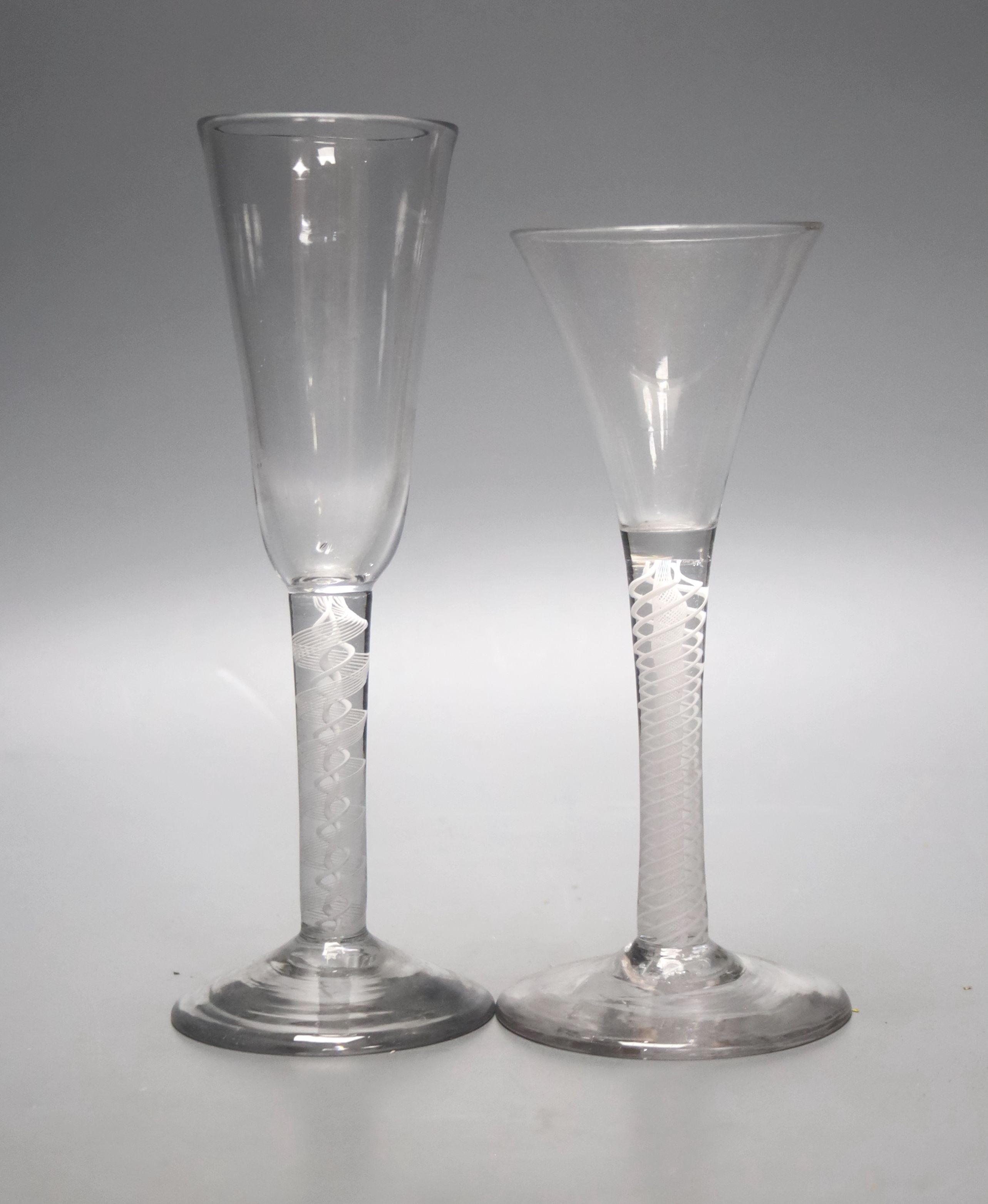 Two Georgian opaque twist stem ale glasses, c.1765